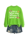 Détail du sweat-shirt vert vif avec des illustrations colorées et des slogans - Sweat-shirt Vert Néon (Graphique Blanc)