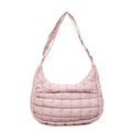 Macro shot of pink quilted puff shoulder bag detailing stitching and front zipper pocket - Pink