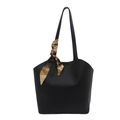Minimalist black faux leather tote bag with elegant floral scarf decoration on a white background - Black