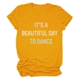 Close-up of ginger yellow cotton T-shirt with 'IT'S A BEAUTIFUL DAY TO DANCE' print - S / Mustard Yellow