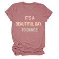 Close-up of dusty pink t-shirt featuring IT'S A BEAUTIFUL DAY TO DANCE printed design - Rose Gold
