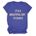 Close-up of blue cotton T-shirt featuring IT'S A BEAUTIFUL DAY TO DANCE text print - Vintage Blue
