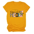 Macro detail of mustard yellow cotton T-shirt featuring artful Teaching is a work of Heart print - S / Mustard Yellow (Black Text)