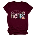 Detail of burgundy Teacher T-shirt showing Teaching is a work of HEART printed slogan - Wine Red (White Text)
