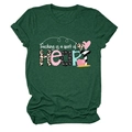 Detail of forest green t-shirt featuring colorful Teaching is a work of HEART print - Retro Green (White Text)