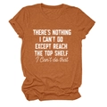 Close-up of burnt orange crew neck t-shirt featuring vintage slogan print and soft texture - Burnt Orange (White Text)