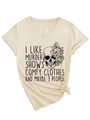 Detail of V-neck apricot T-shirt with skull floral print and witty typography design - S / Sand (Black Print)
