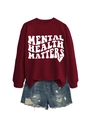 Detail of burgundy Mental Health Matters sweatshirt with denim shorts on white background - Wine Red (White Font)