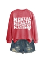 Detail of Mental Health Matters slogan print on red sweatshirt with distressed denim shorts - Red (White Font)