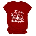 Detail of red crew neck T-shirt featuring bold white 'well well well' artistic text - Red (White Font)