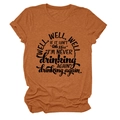 Close-up of the burnt orange crew neck T-shirt with vintage black artistic text print - Burnt Orange (Black Font)