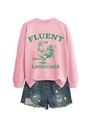 Détail d'un sweat rose avec motif coq et d'un short en jean posé à plat - Rose