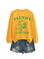 Détail du sweat jaune avec imprimé coq vert et texte humoristique sur le devant - Jaune