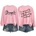Detail of Stronger Than The Storm pink sweatshirt front print and back text design - S / Black Font / Pink