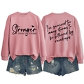 Front and back view of pink long sleeve sweatshirt with Stronger Than The Storm print - S / Black Font / Rose Gold