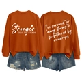 Detail of burnt orange sweatshirt showing front and back motivational text prints - S / White Font / Burnt Orange