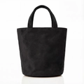 Minimalist black faux suede bucket tote bag with round handles and matte texture finish - Black