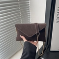 Dark brown suede envelope crossbody bag with gold chain strap and metal ring buckle - Brown