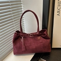 Burgundy faux suede tote bag with leather handles and decorative metal buckle strap - Red