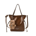 Brown glossy bucket bag with metal chain strap and plush bear charm for fashion women - Brown with Pendant