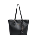 Minimalist black leather tote bag with elephant charm and adjustable shoulder strap - Black
