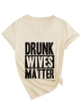 Detail of V-neck T-shirt showing Drunk Wives Matter print and stylish side-knot hem detail - S / Sand (Black Font)