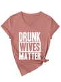 Close-up of V-neck brick red t-shirt with Drunk Wives Matter slogan and side knot - Rose Gold (White Font)