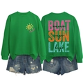 Dettaglio della felpa verde con motivo solare e set di pantaloncini in denim strappati - S / Verde Erba-Stampa Nera
