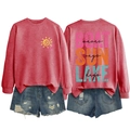 Detail of red boat sun lake waves sweatshirt paired with distressed denim shorts - Red-Black Text Print