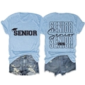 Detailed front and back view of light blue Senior 2026 graduation graphic t-shirt - Light Blue (Black Font)