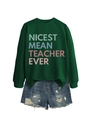 Detail of dark green crewneck sweatshirt with Nicest Mean Teacher Ever colorful text print - Dark Green