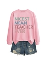 Flat lay detail of pink sweatshirt and denim shorts with Nicest Mean Teacher Ever print - Pink