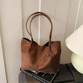Retro dark brown suede tote bag with minimalist design on a stylish interior background - Brown