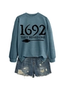 Detail view of 1692 They Missed One print on a casual blue-grey crewneck sweatshirt - Blue Sweatshirt (Black Font)
