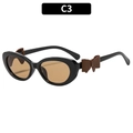 Y2K cat-eye zonnebril met zwart montuur, bruine glazen en leren strik-decoratie - Zwart Frame Thee Lenzen (C3)