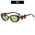 Lunettes de soleil Y2K yeux de chat avec monture écaille, verres verts et nœuds bruns - Monture Écaille Verres Verts (C5)