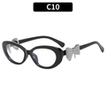 Lunettes de soleil œil de chat Y2K noires brillantes avec détails nœud argenté - Monture Noire Verres Transparents (C10)