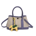 Bolso saco chic de lona beige y cuero morado con un colgante de pegaso amarillo - Púrpura Oscuro