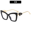 Black cat-eye sunglasses with golden metal temples and decorative double heart detail - Black Frame Black Heart Clear Lens