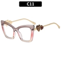 Cat eye glasses featuring brown-pink gradient frames and gold heart temples style C11 - Grey Pink Frame White Lens