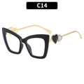 Cat-eye glasses with black frames, gold metal temples, and dual heart-shaped details - Black Frame White Heart Clear Lens