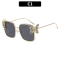 Gafas de sol de mariposa cuadradas en metal dorado con diamantes y lentes grises - Montura Dorada Lente Gris