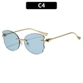 Gafas de sol de mariposa sin montura con lentes azul claro y montura de oro metal - Montura Dorada Lentes Azules