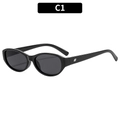 Gafas de sol ovaladas negras clásicas con lentes oscuras y detalles de plata - Montura Negra Lente Gris