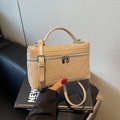 Chic beige crossbody vanity bag featuring quilted texture and stylish top handle - Khaki