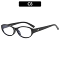 Classic oval black sunglasses featuring vintage frame and silver metal temple accents - Black Frame Clear Lenses
