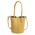 Minimalist bright yellow bucket bag with lychee texture and adjustable shoulder strap - Yellow