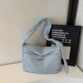 Light blue quilted shoulder bag with soft wavy texture and spacious tote design - Blue