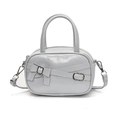 Chic light blue-grey bowling handbag with leather bow detail and silver metal buckle - Blue