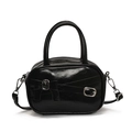Glossy black bowling handbag with bow detail and silver hardware accents - Black